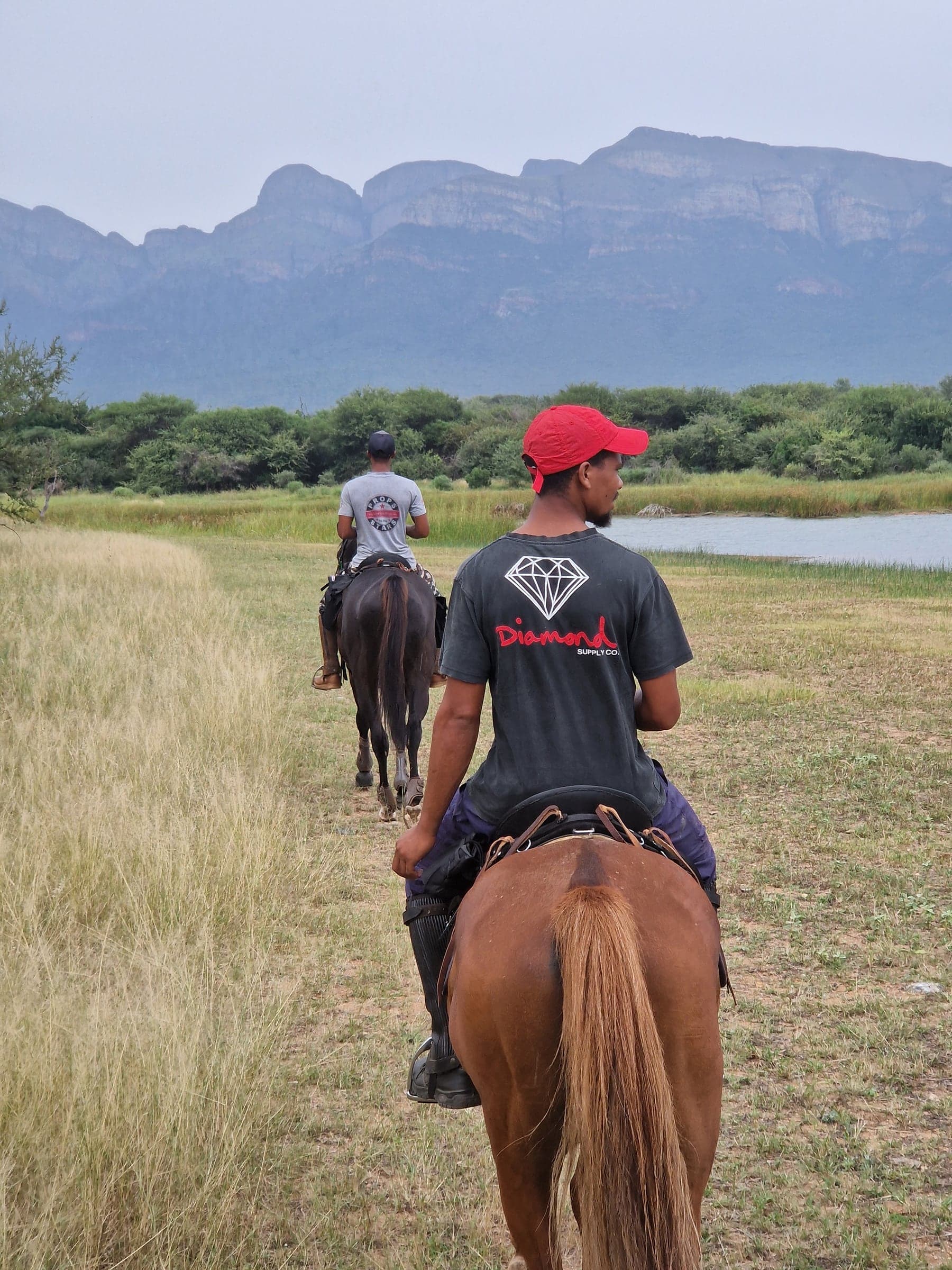 Water and mountain view on a Bambelela trail ride
